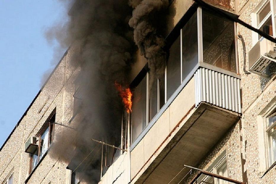 Курение на балконе может стать причиной пожара